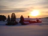 Soleil couchant sur un paysage enneigé en Bourgogne-Franche-Comté - © Patrick Bruot